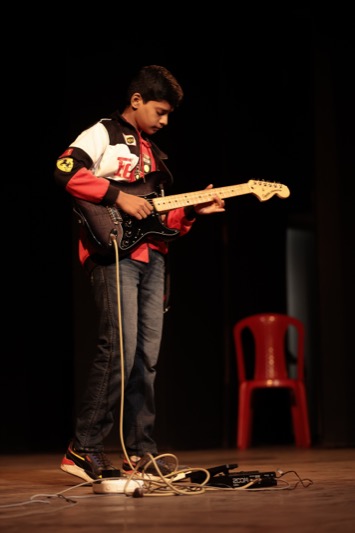 A young performer on the Showcases stage